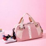 WAZDORF Duffle Bag for Travel, Waterproof Nylon Weekender Bag for Women & Men, Large Carry on Luggage with Shoe Compartment, Bottle Holder & 4 Storage Pockets, Versatile Shoulder Bag(51 x 22 x 26 cm) - Image 3