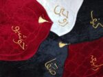 Velvet Prayer Mat with Gold Arabic Calligraphy Engraved and Tassel, Red, Black, and White - Image 2