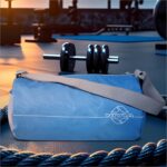 NIVIA Basic Polyester Duffle Bag for Men & Women, Side Mesh Pocket, Workout & Training Bag, Suitable for Gym, Fitness, Sports & Travel with Adjustable Shoulder Strap (Sky/Grey), Capacity-11L - Image 2